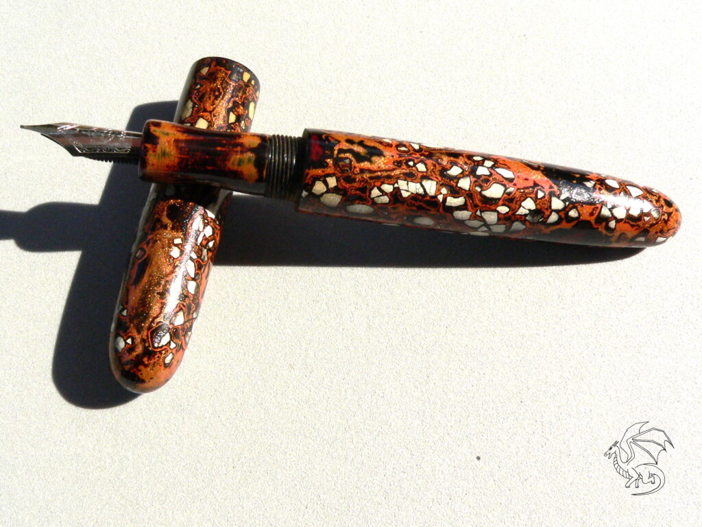 ebonite egg pen from Wet&Wise that got an urushi treatment combined with egg. one a pattern was created with broken egg shell (Rankaku urushi)